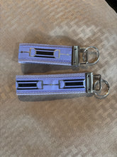 Load image into Gallery viewer, Keychain, Silver snaffles on purple ribbon.