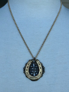 Necklace, filigree horseshoe