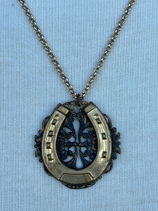 Necklace, filigree horseshoe